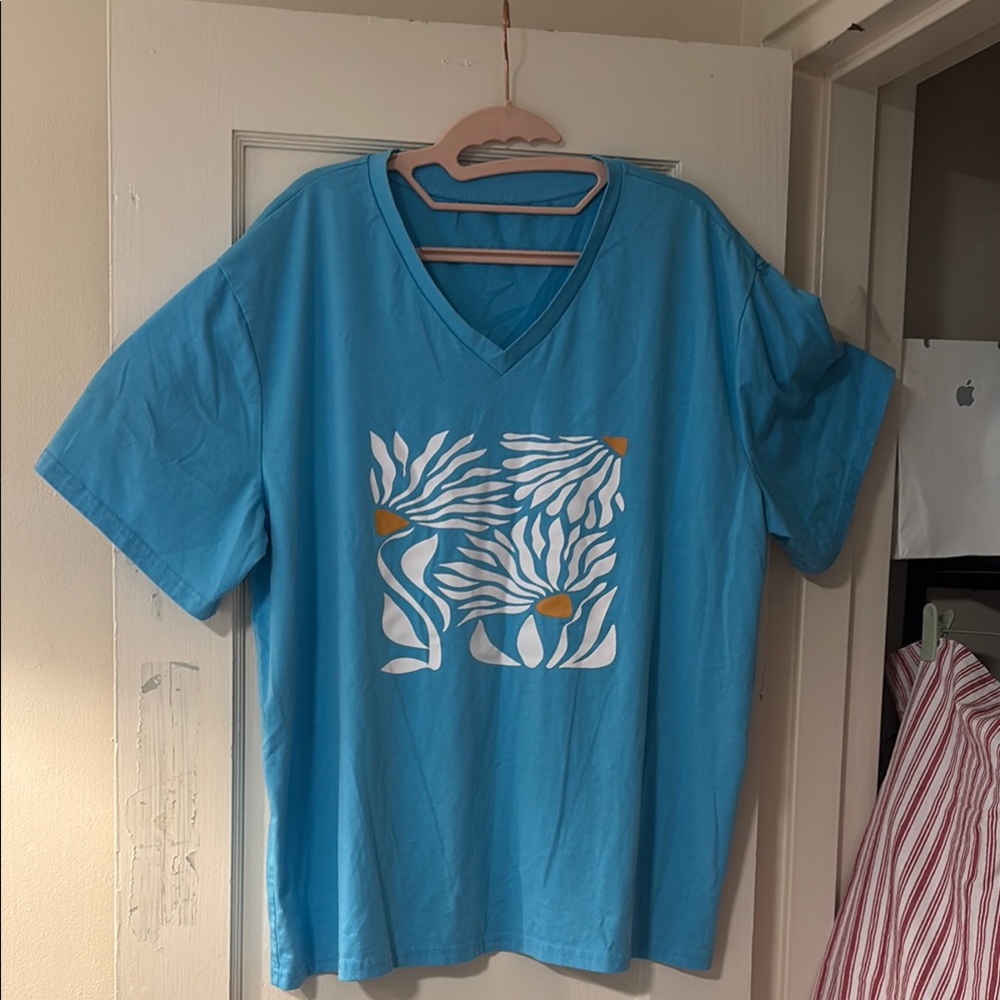 Blue Graphic T-Shirt with Floral Design